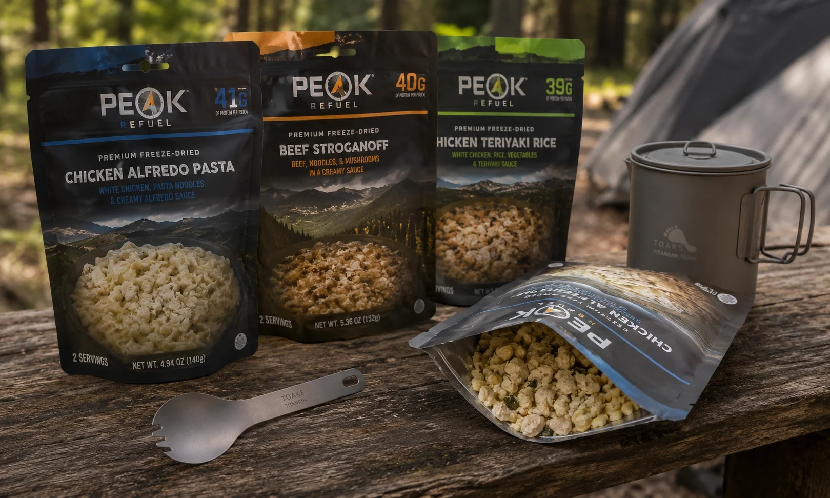 Prepared camping meals in packets and containers ready for packing
