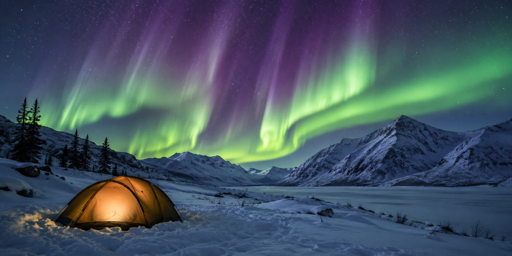 Snow camping in Alaska wilderness with northern lights